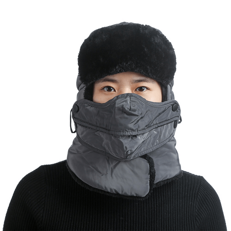 Winter windproof ski cap with earflaps and closed neck, unisex design in dark color, perfect for cold mountain conditions.